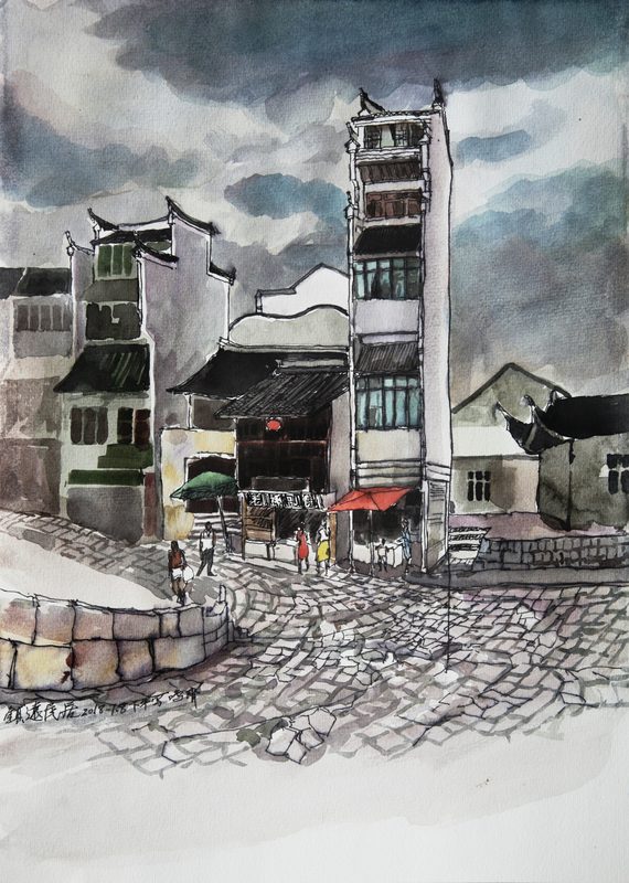 The traditional houses of Zhenyuan, with their grey tiles and white walls,